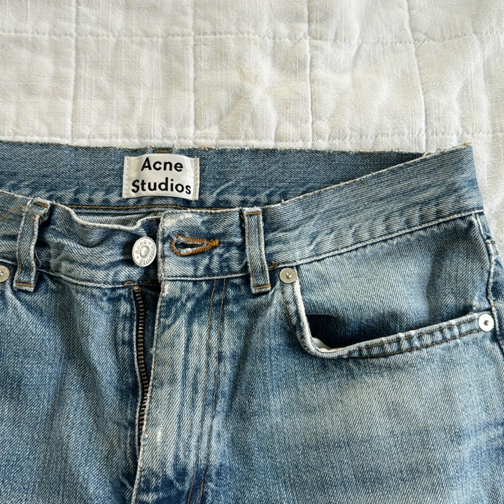 Acne Studios ripped knee jeans